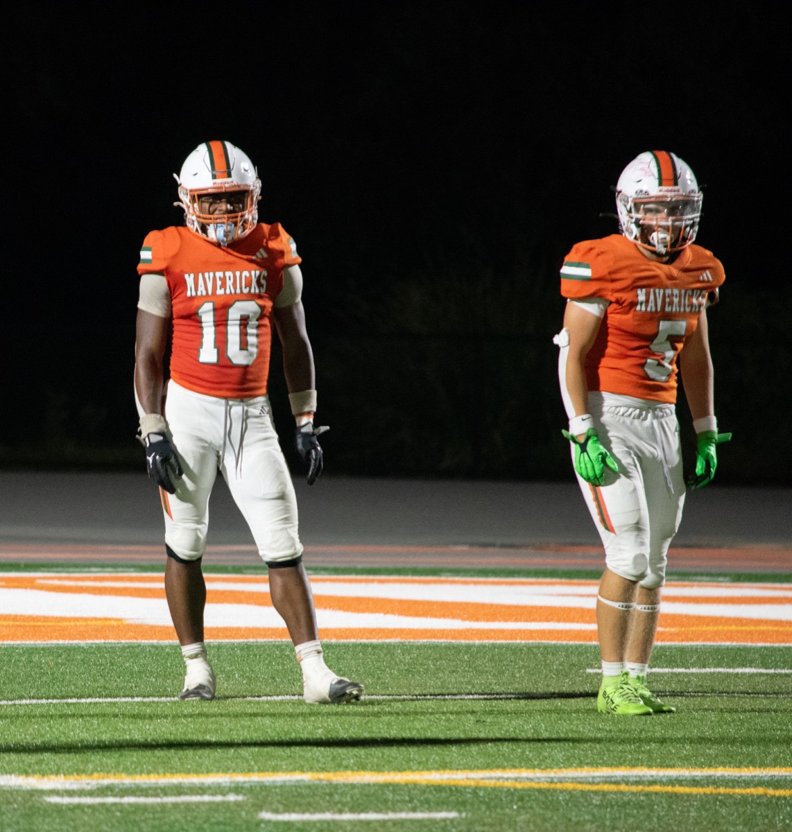 Varsity #10 and #5 on the orange paint vs St. Vincent.